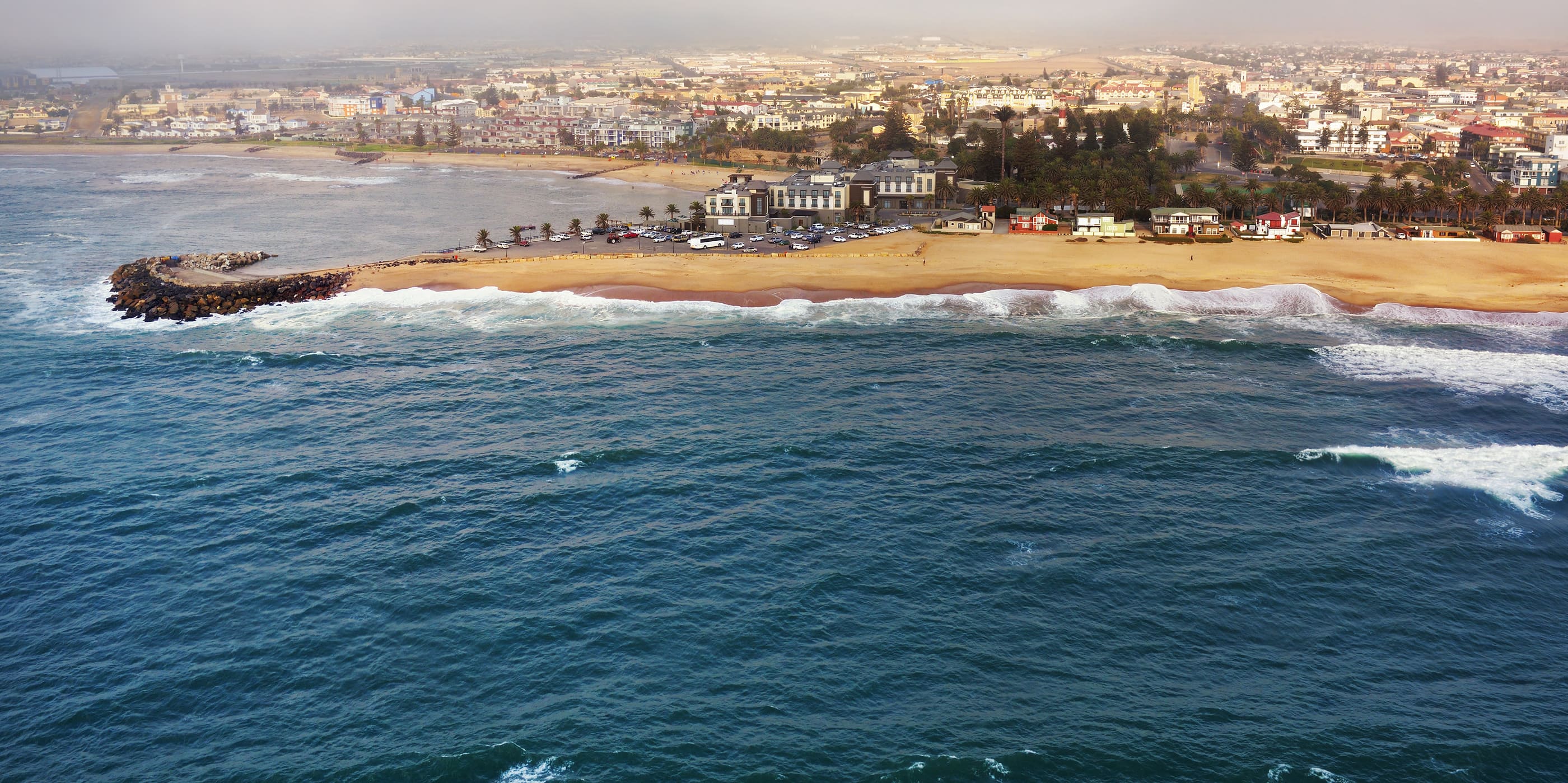 Aerial view on the coast in Namibia and historical districrts of the city Swakopmund in the Namib desert, Atlantic ocean, Africa