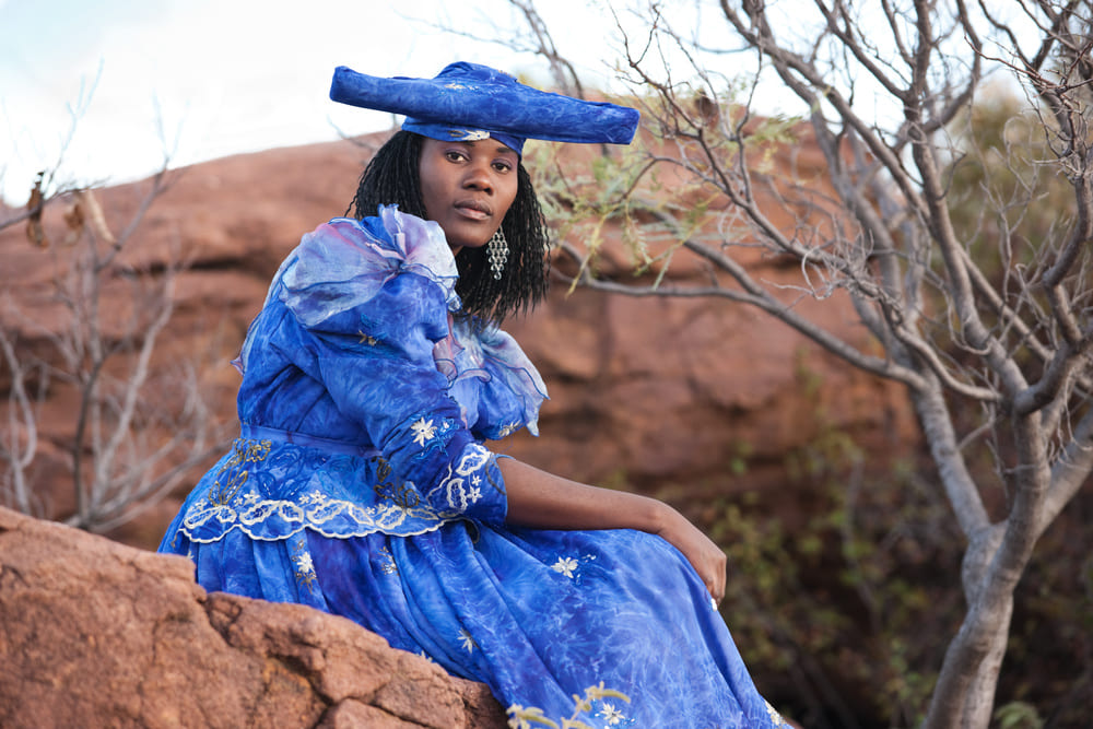 herero african girl with traditional clothing, hairstyle and jewelry, Namibia, South Africa, and Botswana