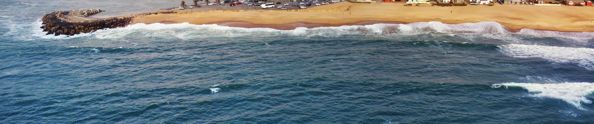 Aerial view on the coast in Namibia and historical districrts of the city Swakopmund in the Namib desert, Atlantic ocean, Africa